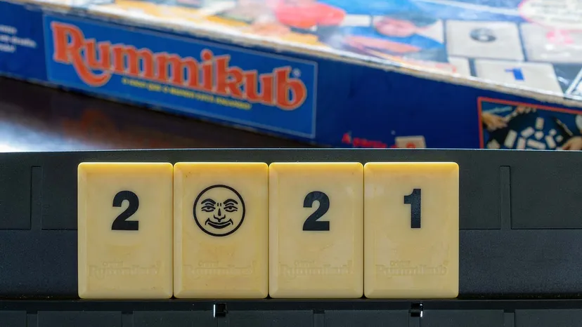 Rummikub joker used strategically to complete a run on the table