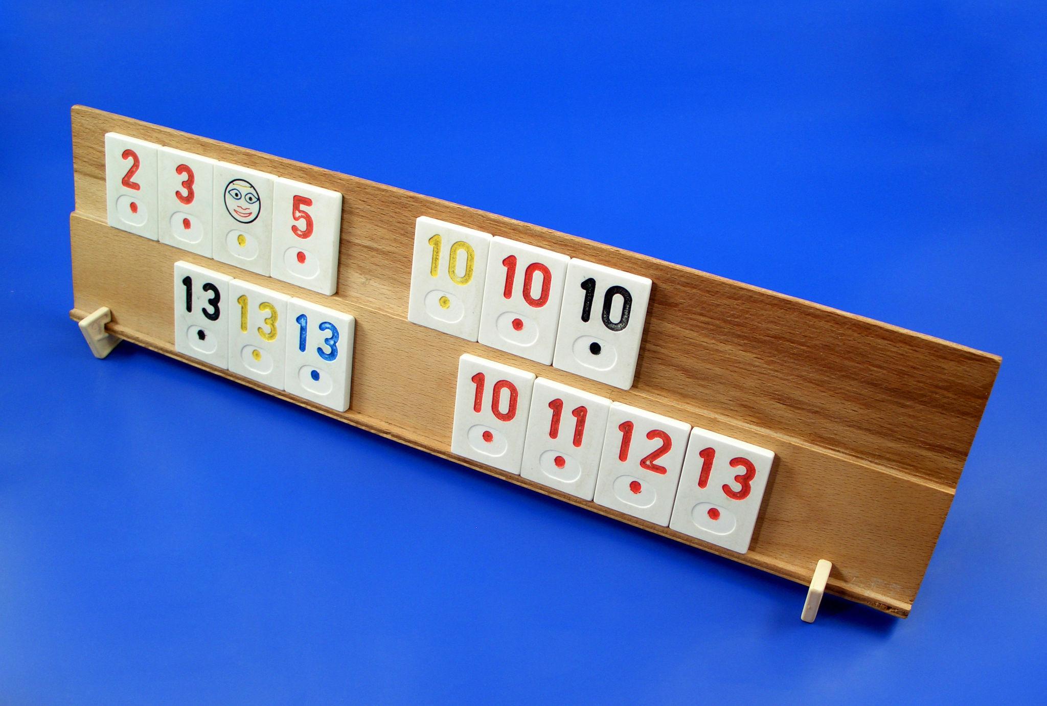 rummikub tiles arranged on rack example